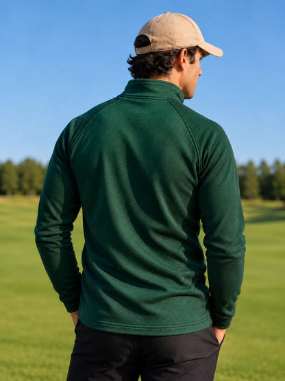 Golf-Pullover aus Funktionsmaterial in Waldgrün mit diagonaler Rippstruktur und Viertelreißverschluss