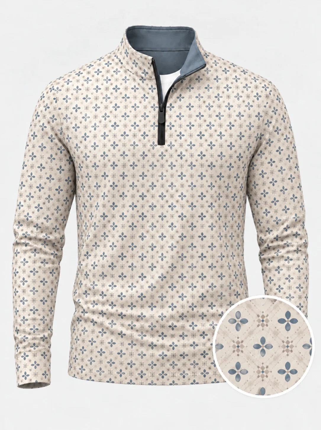 Cremefarbener Golfpullover aus Funktionsmaterial mit blauem Blumenmuster und kurzem Reißverschluss